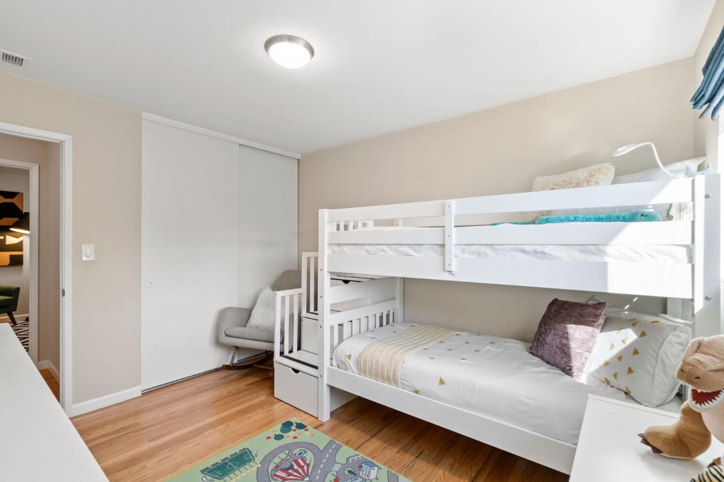 5074 Williams Road San Jose, CA 95129 - Photo 19 of 35 a bedroom with a bed and a couch