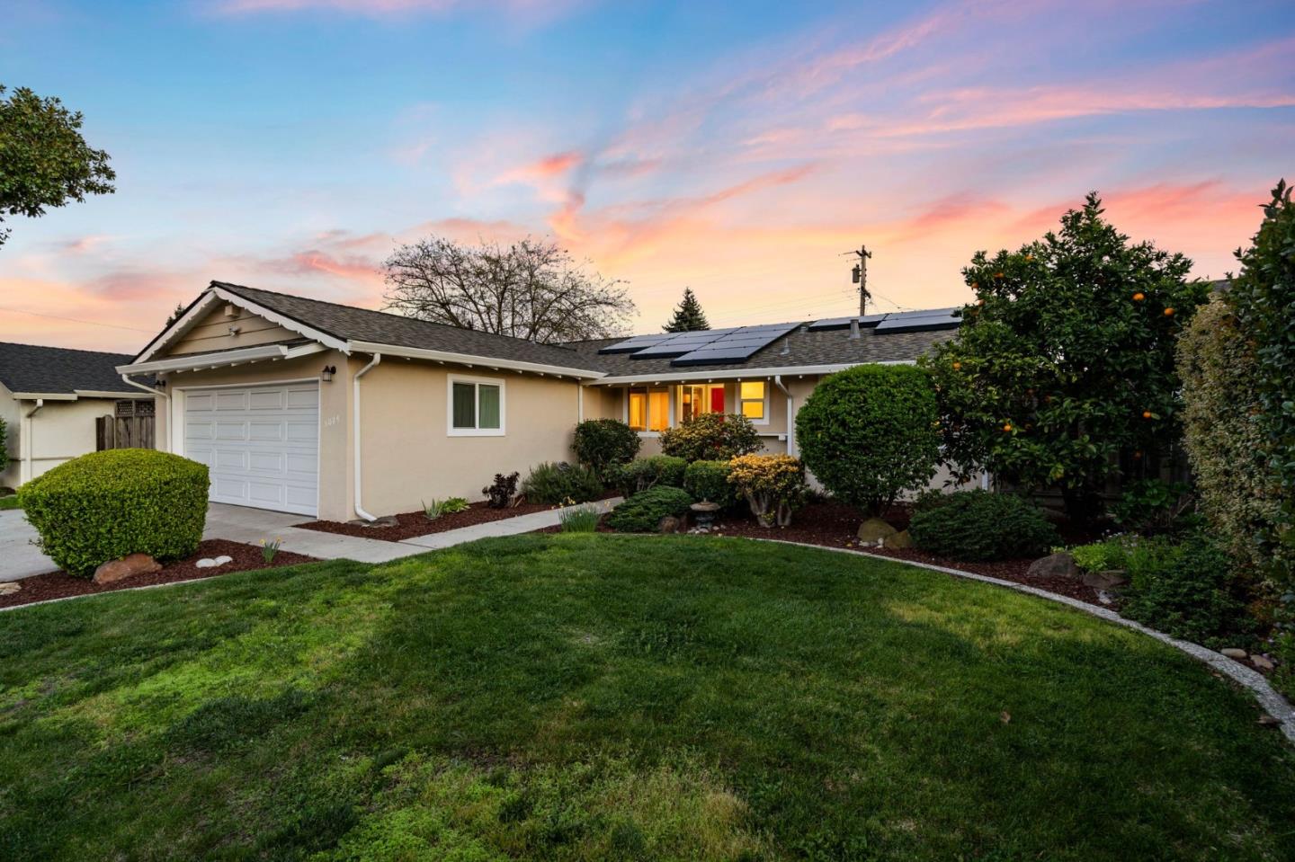 5074 Williams Road San Jose, CA 95129 - Photo 31 of 35 a view of a house with a yard