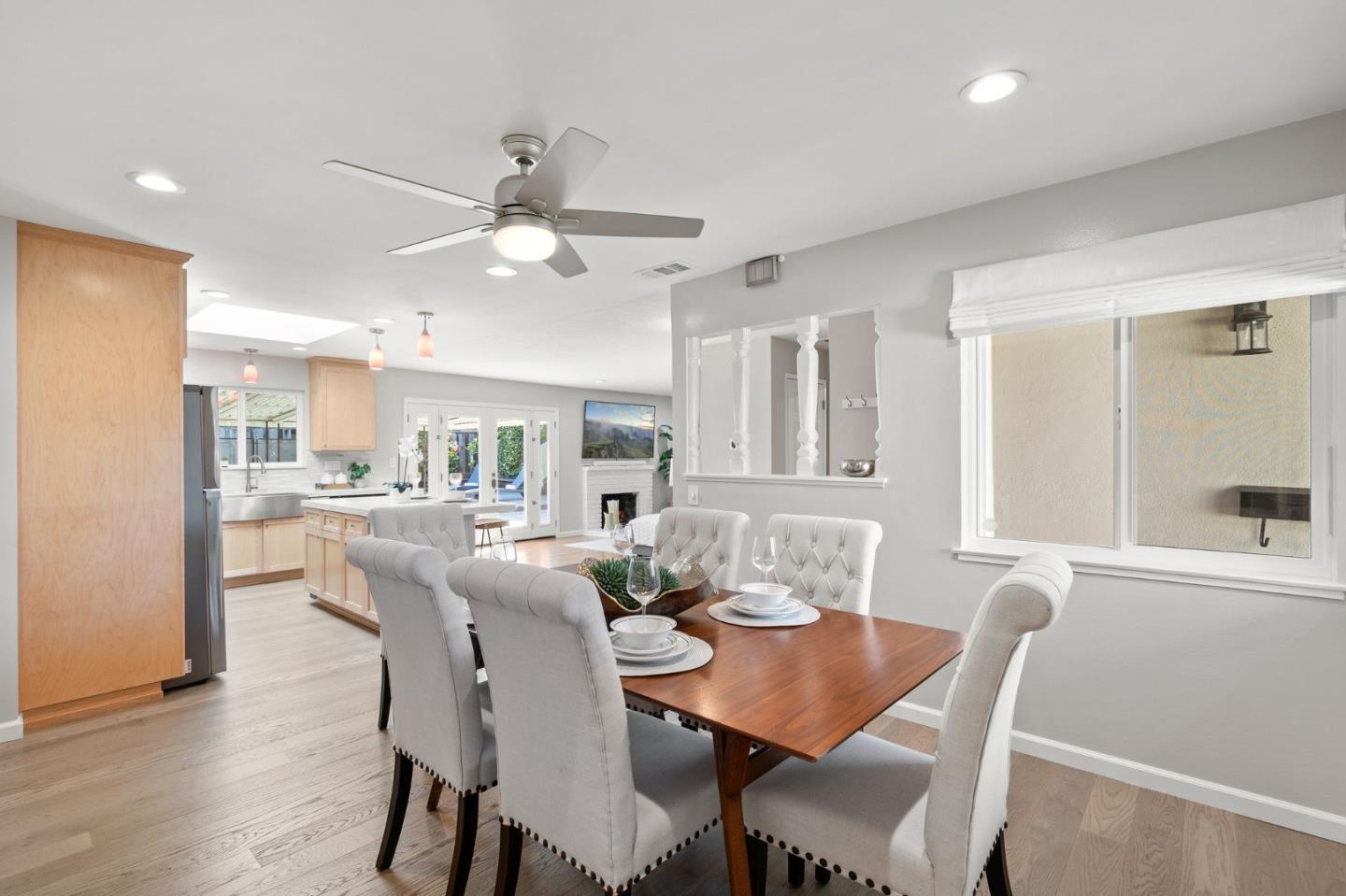 5074 Williams Road San Jose, CA 95129 - Photo 8 of 35 a view of a dining room with furniture and wooden floor