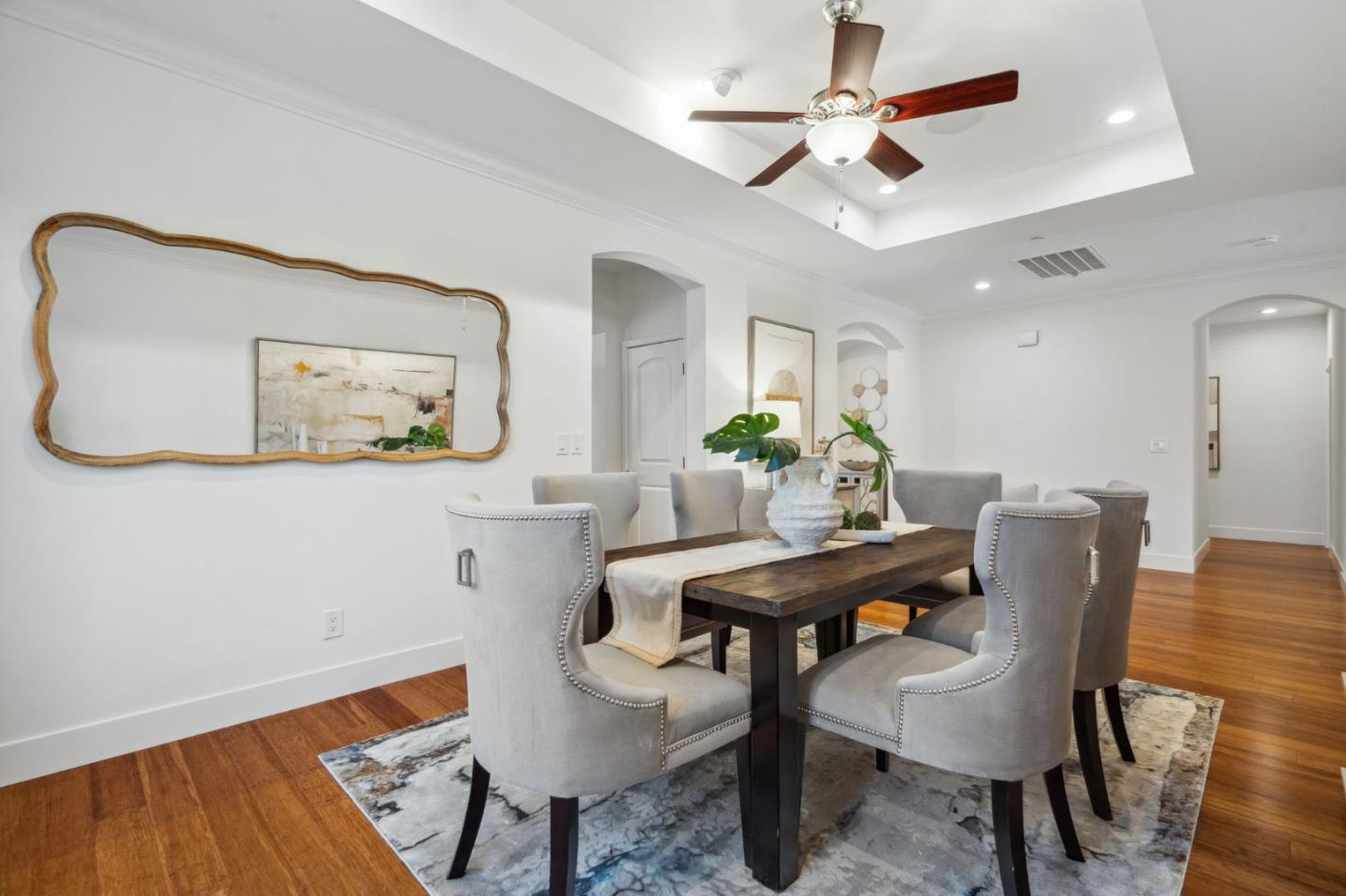 1372 Hoffman Lane Campbell, CA 95008 - Photo 8 of 48 a view of a dining room with furniture and a chandelier fan