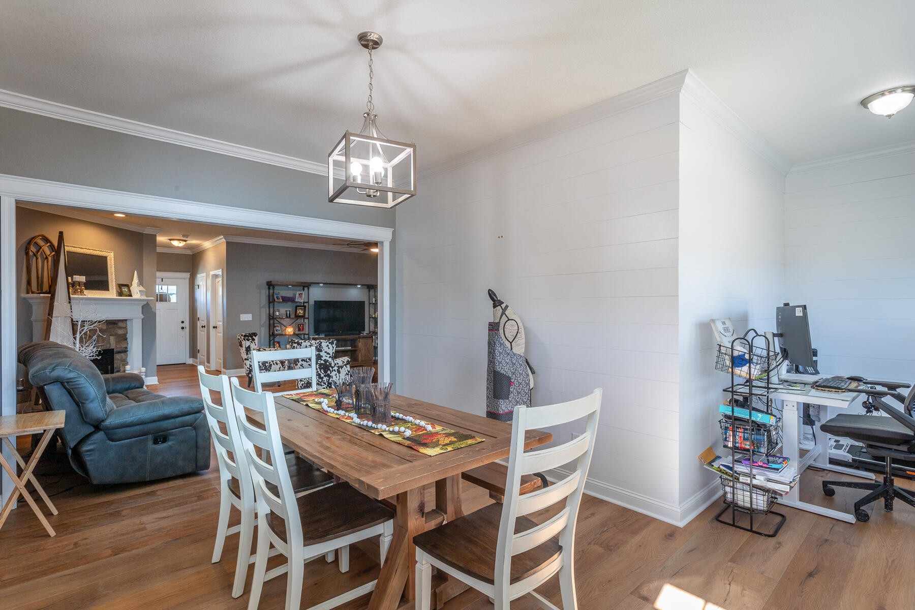 875 Colony Circle Fort Oglethorpe, GA 30742 - Photo 15 of 42 a view of a dining room with furniture wooden floor and chandelier