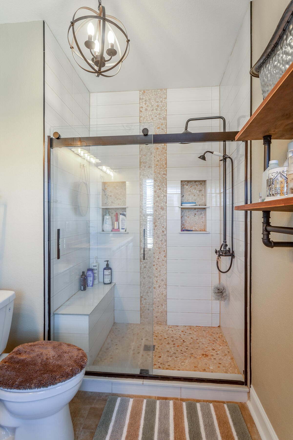 875 Colony Circle Fort Oglethorpe, GA 30742 - Photo 25 of 42 a bathroom with a granite countertop shower and a toilet