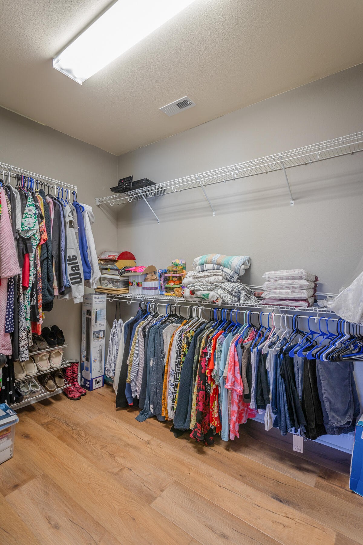 875 Colony Circle Fort Oglethorpe, GA 30742 - Photo 26 of 42 a view of walk in closet with clothes