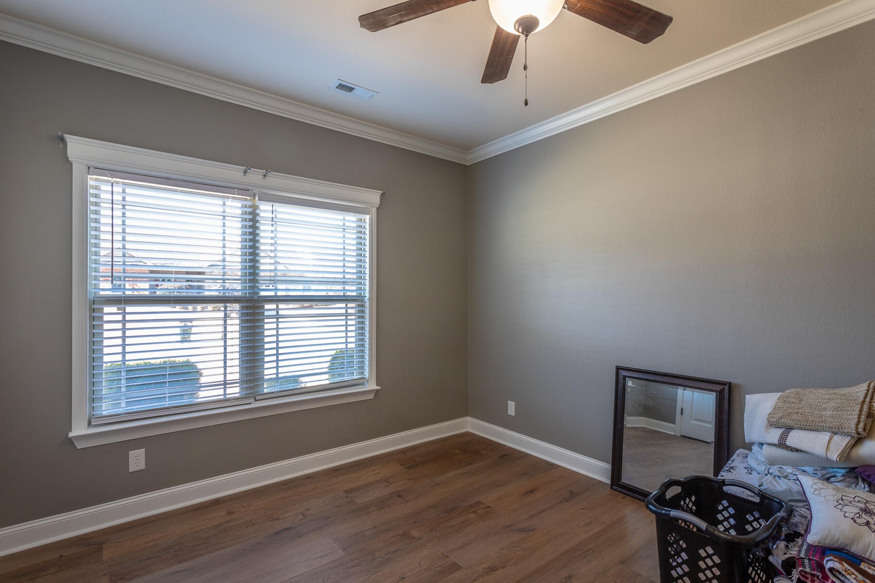875 Colony Circle Fort Oglethorpe, GA 30742 - Photo 27 of 42 a view of a livingroom with a ceiling fan and a window