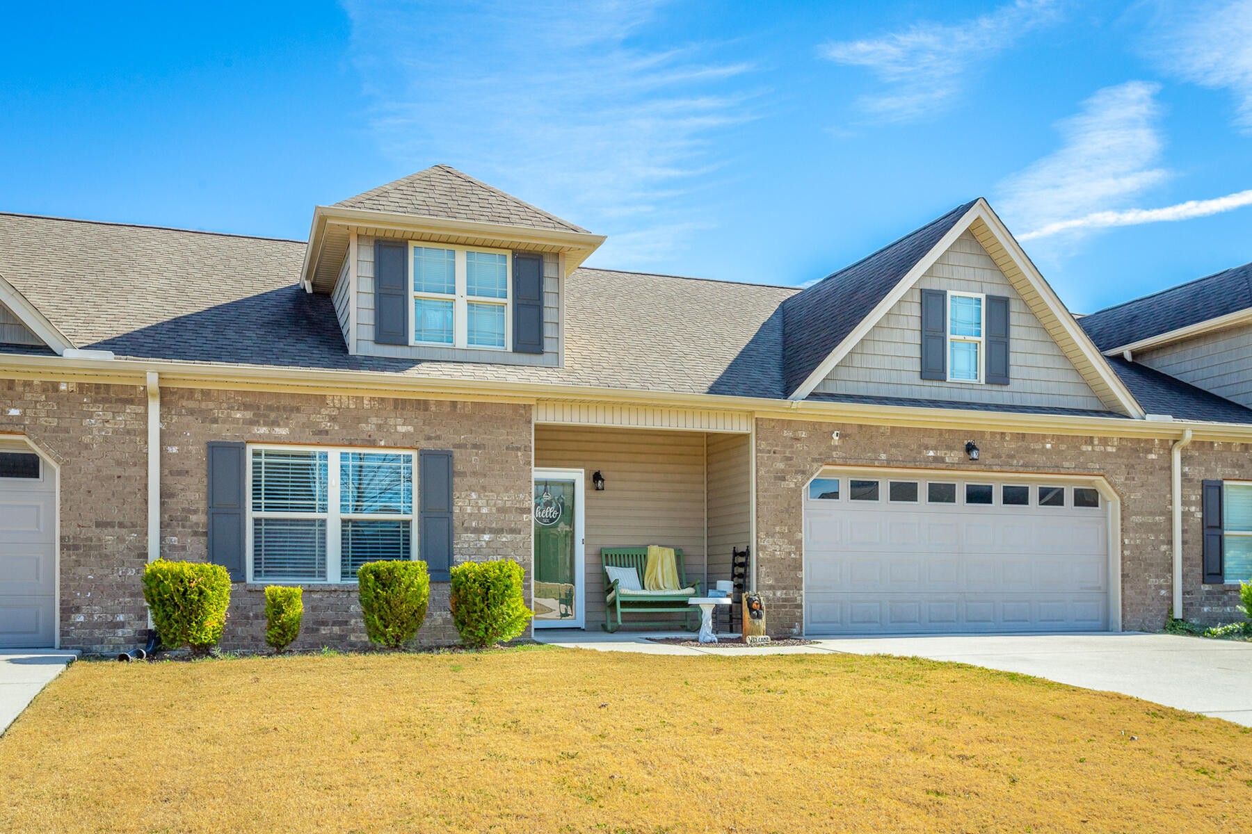 875 Colony Circle Fort Oglethorpe, GA 30742 - Photo 3 of 42 a front view of a house with a yard