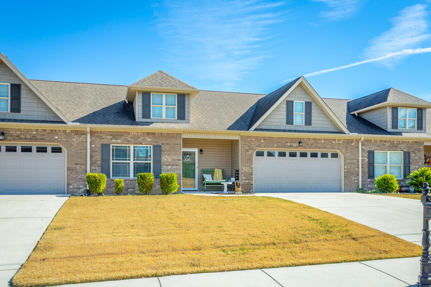 875 Colony Circle Fort Oglethorpe, GA 30742 - Photo 31 of 42 a front view of a house with a yard