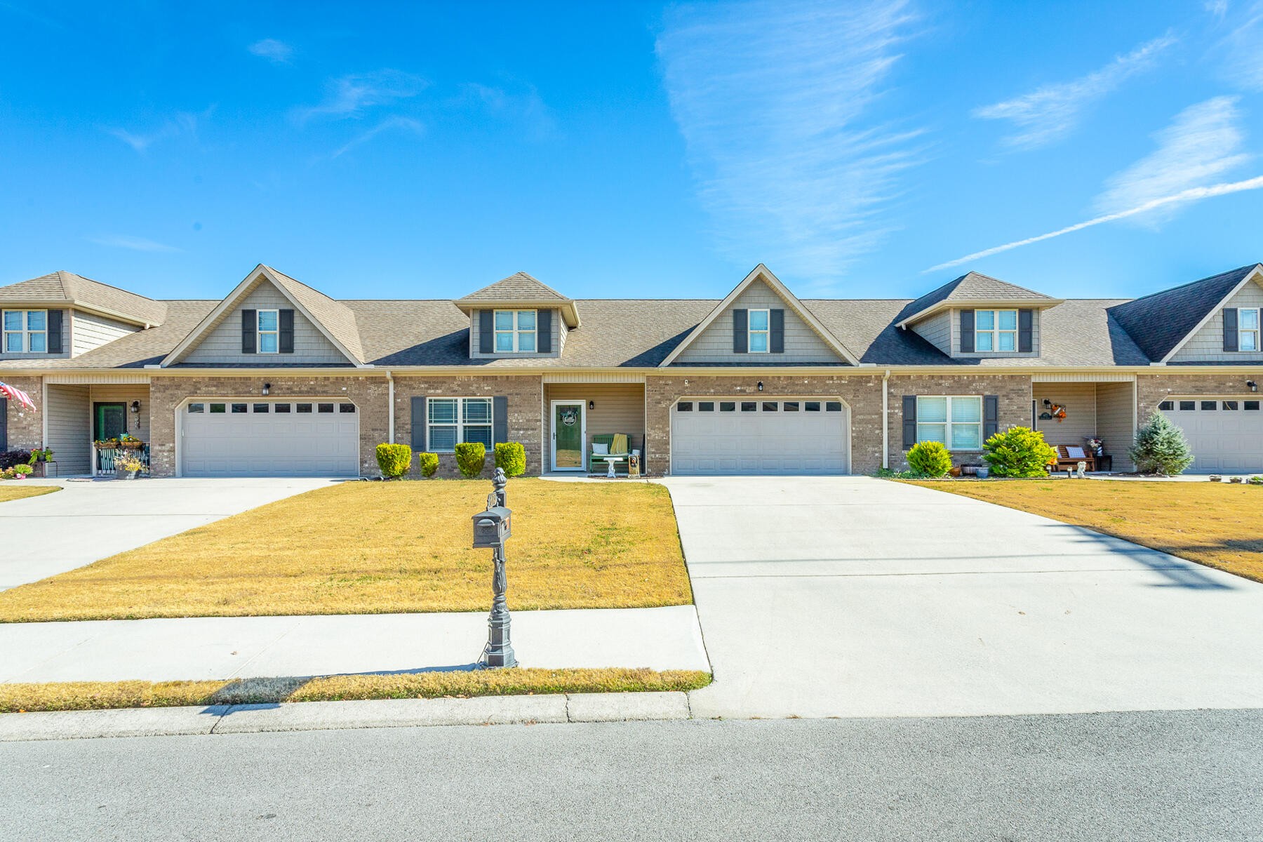 875 Colony Circle Fort Oglethorpe, GA 30742 - Photo 32 of 42 a front view of a house with a yard
