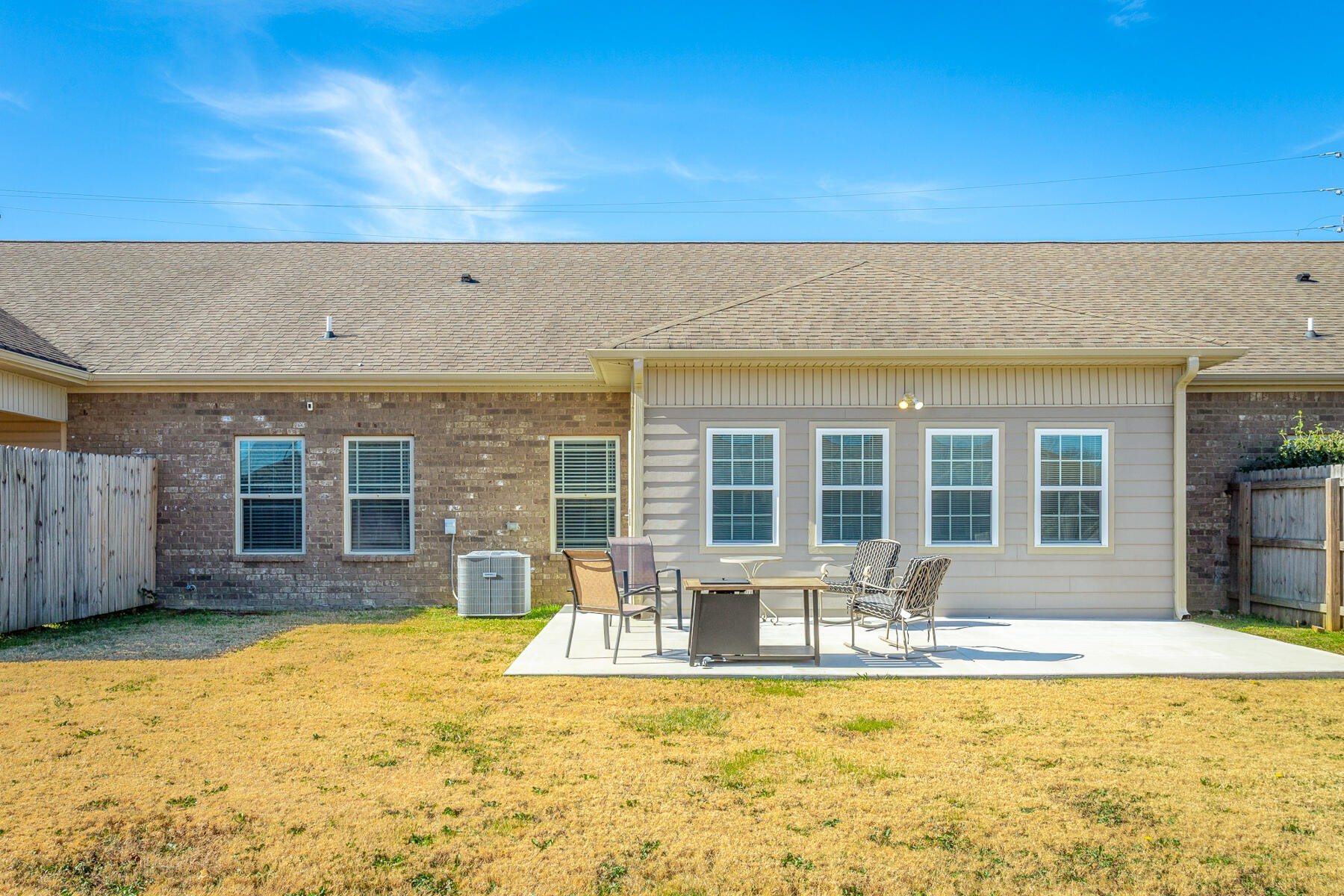 875 Colony Circle Fort Oglethorpe, GA 30742 - Photo 38 of 42 front view of a house with a swimming pool