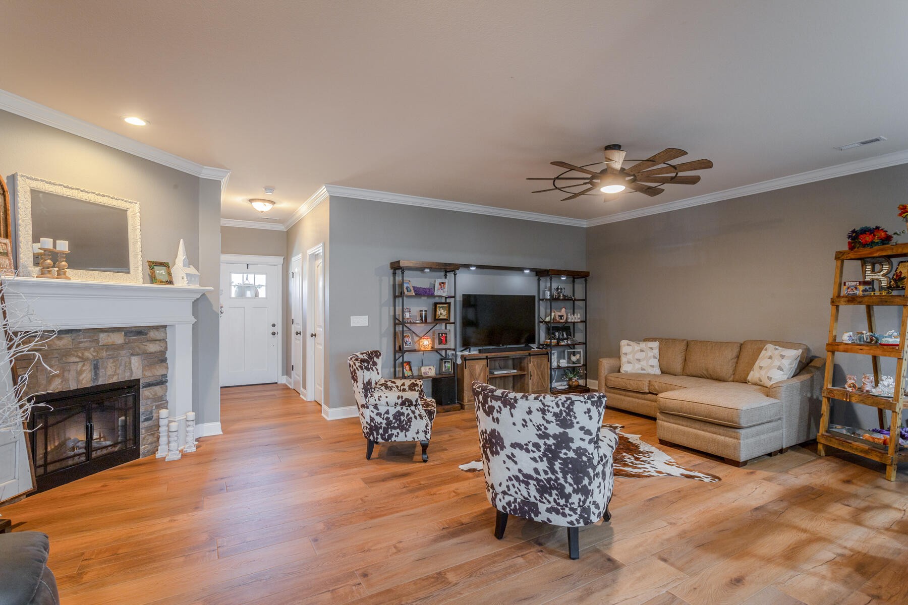 875 Colony Circle Fort Oglethorpe, GA 30742 - Photo 6 of 42 a living room with furniture and a fireplace