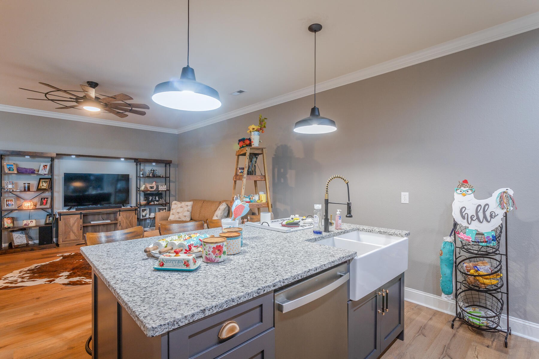 875 Colony Circle Fort Oglethorpe, GA 30742 - Photo 10 of 42 a kitchen with a counter space dining table and chairs