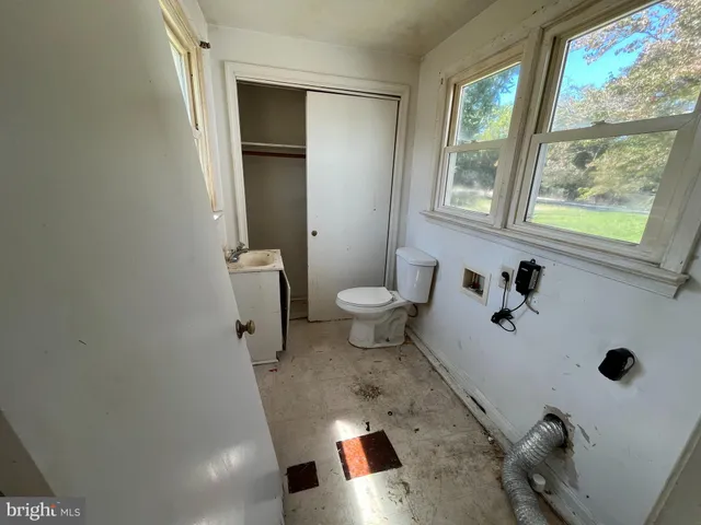 a bathroom with a sink and a toilet