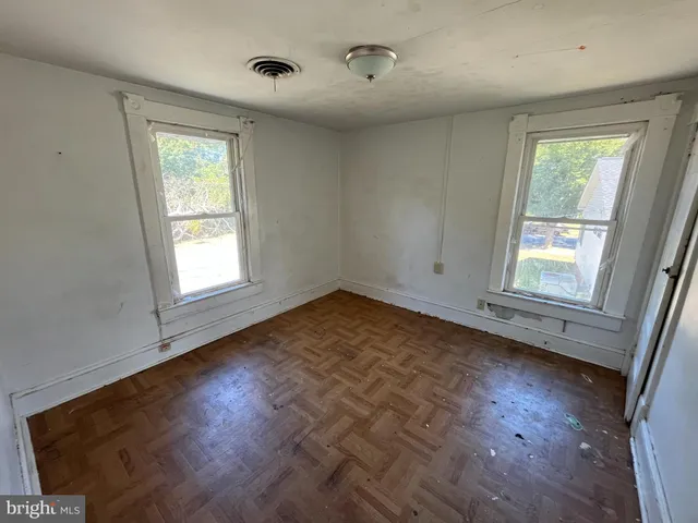 an empty room with windows