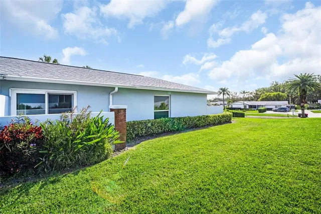 a view of a swimming pool and a garden