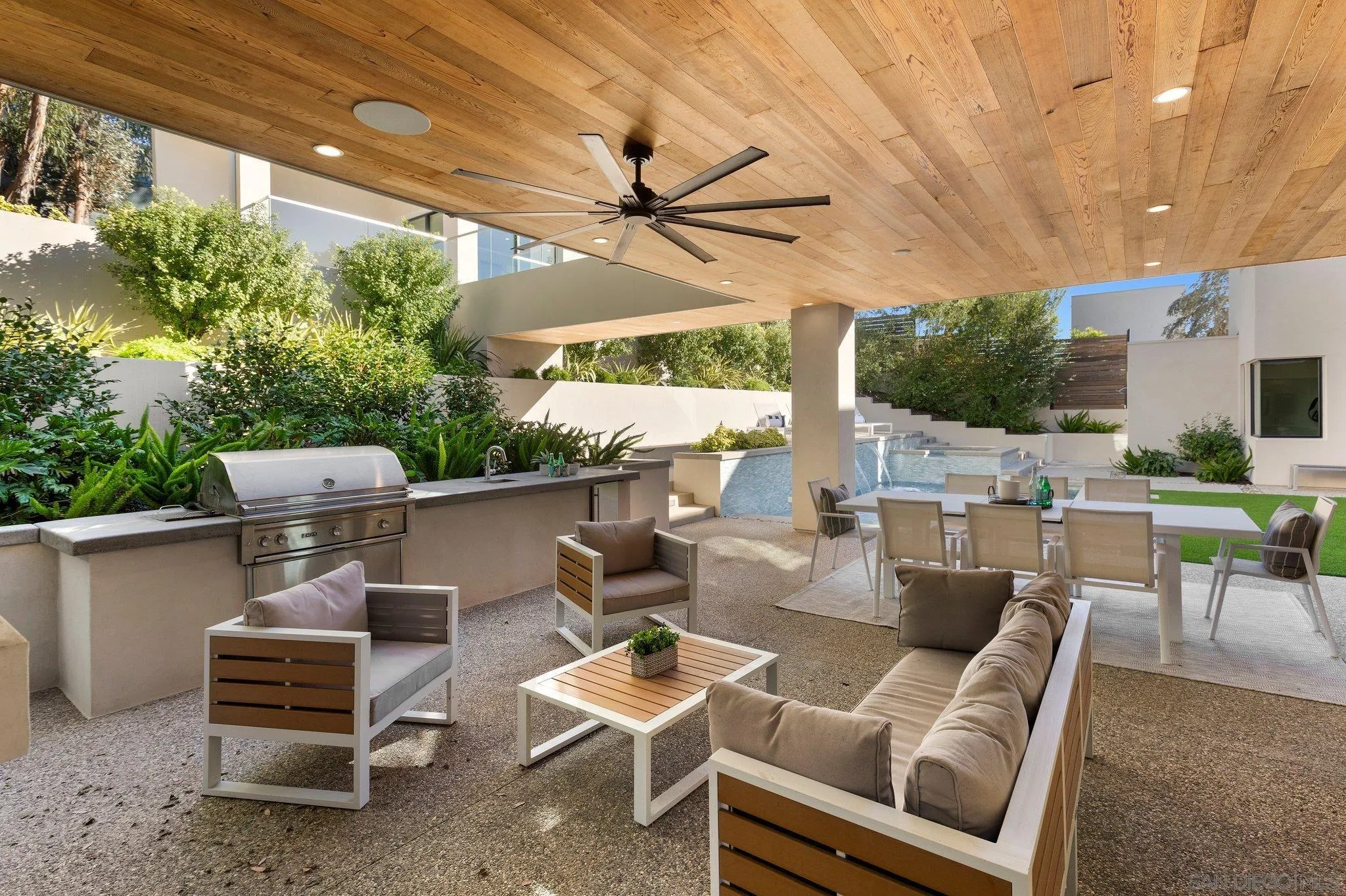 6349 Castejon Drive La Jolla, CA 92037 - Photo 12 of 43 a view of a patio with couches table and chairs