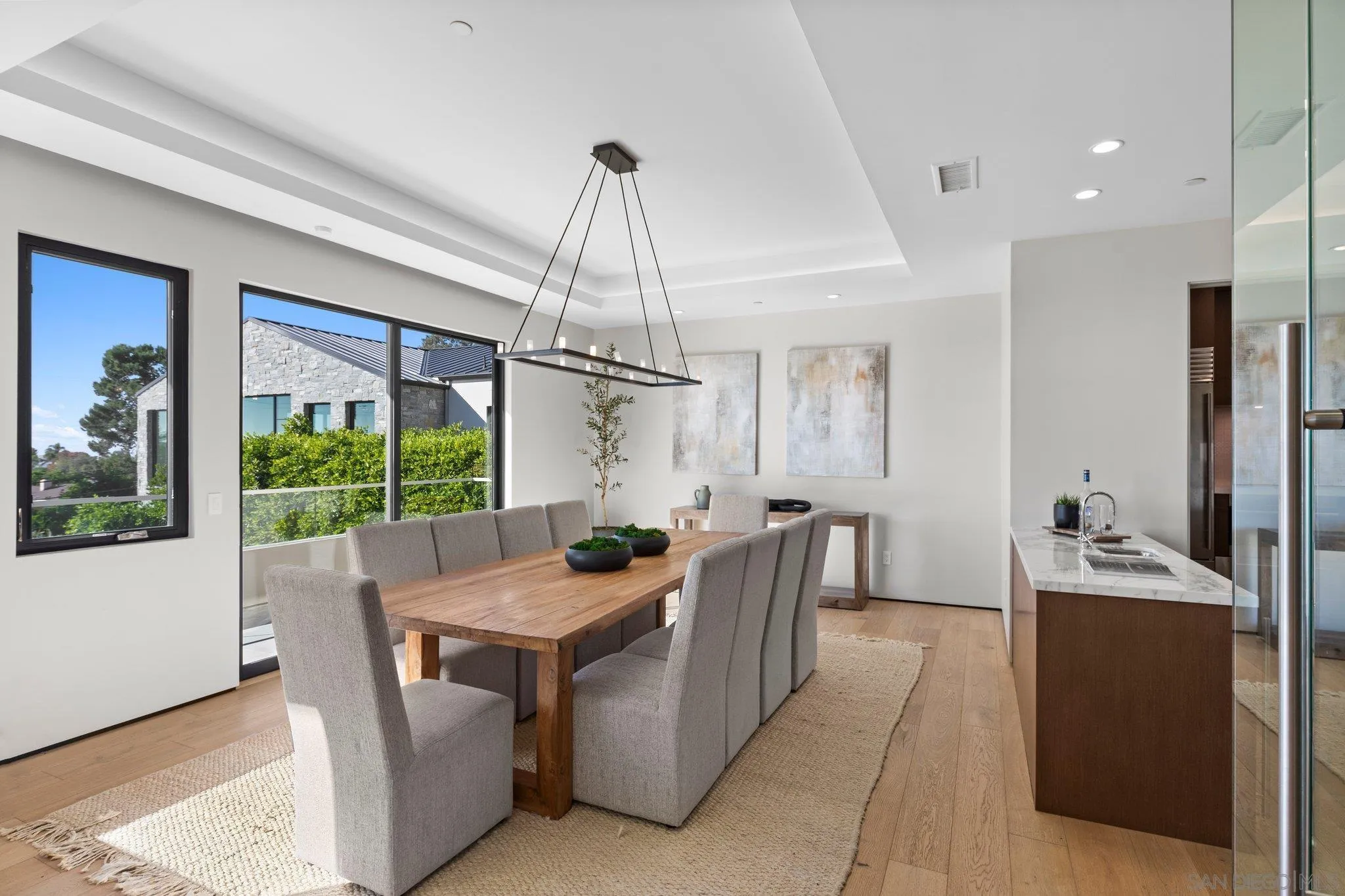 6349 Castejon Drive La Jolla, CA 92037 - Photo 17 of 43 a view of a dining room and furniture window and outside view