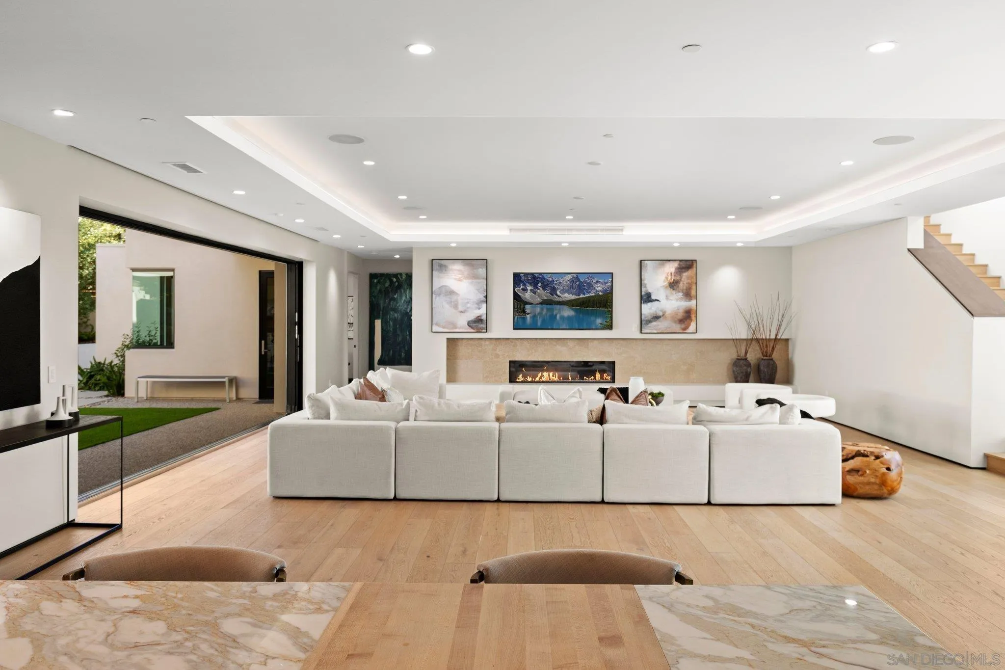 6349 Castejon Drive La Jolla, CA 92037 - Photo 18 of 43 a living room with furniture and a flat screen tv