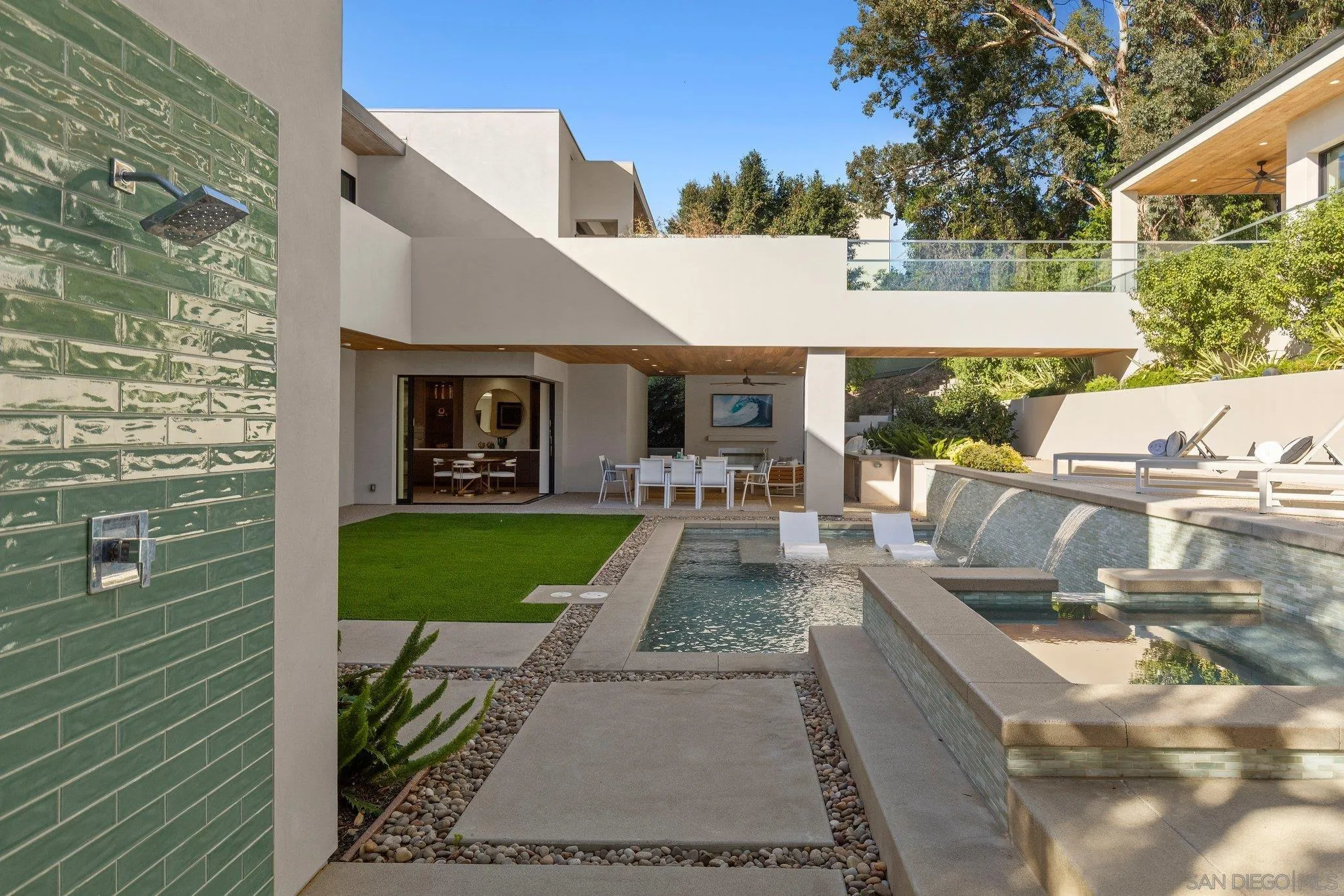 6349 Castejon Drive La Jolla, CA 92037 - Photo 21 of 43 a front view of a house with garden