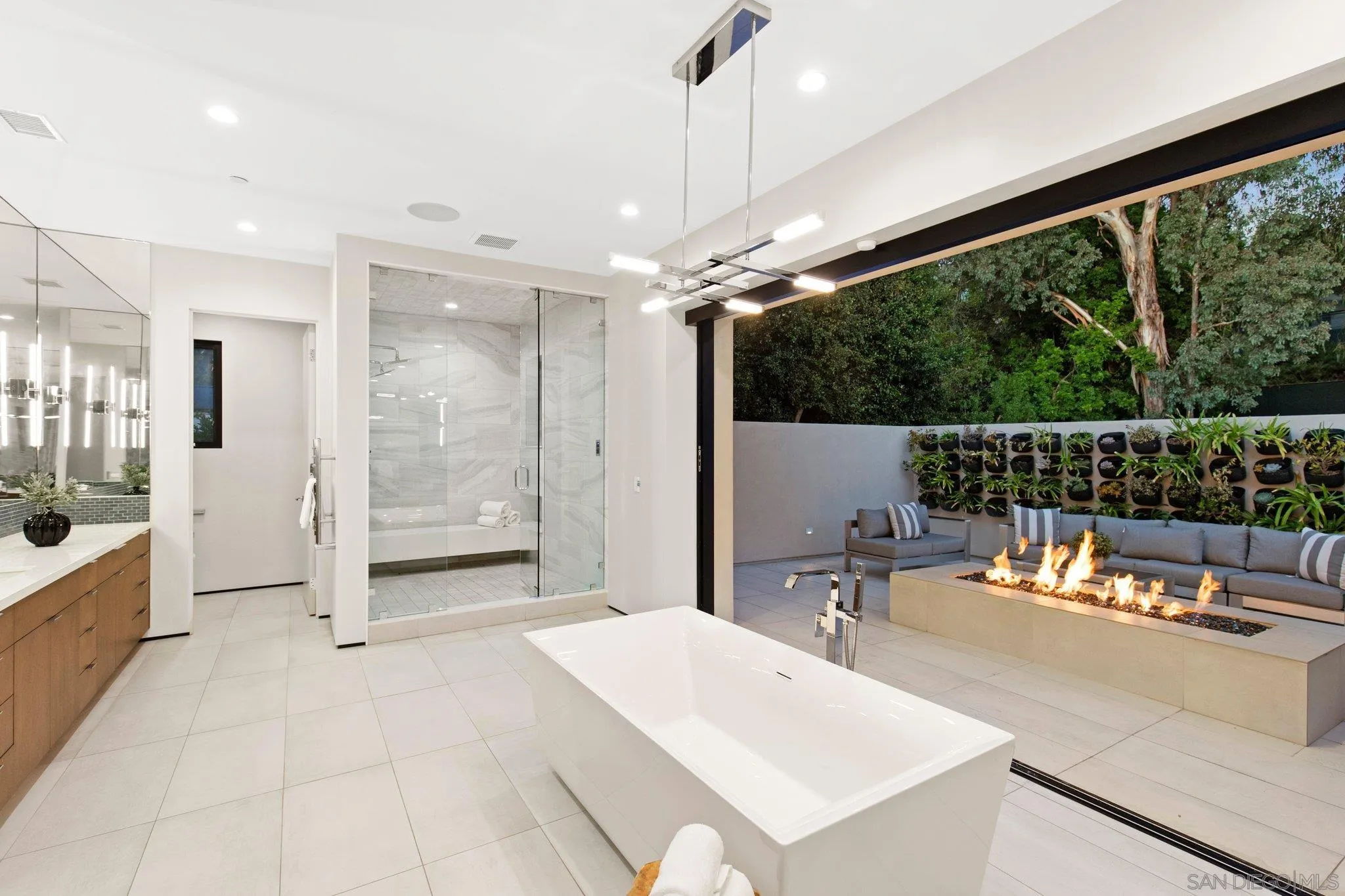 6349 Castejon Drive La Jolla, CA 92037 - Photo 27 of 43 a outdoor space with a large tub and shower