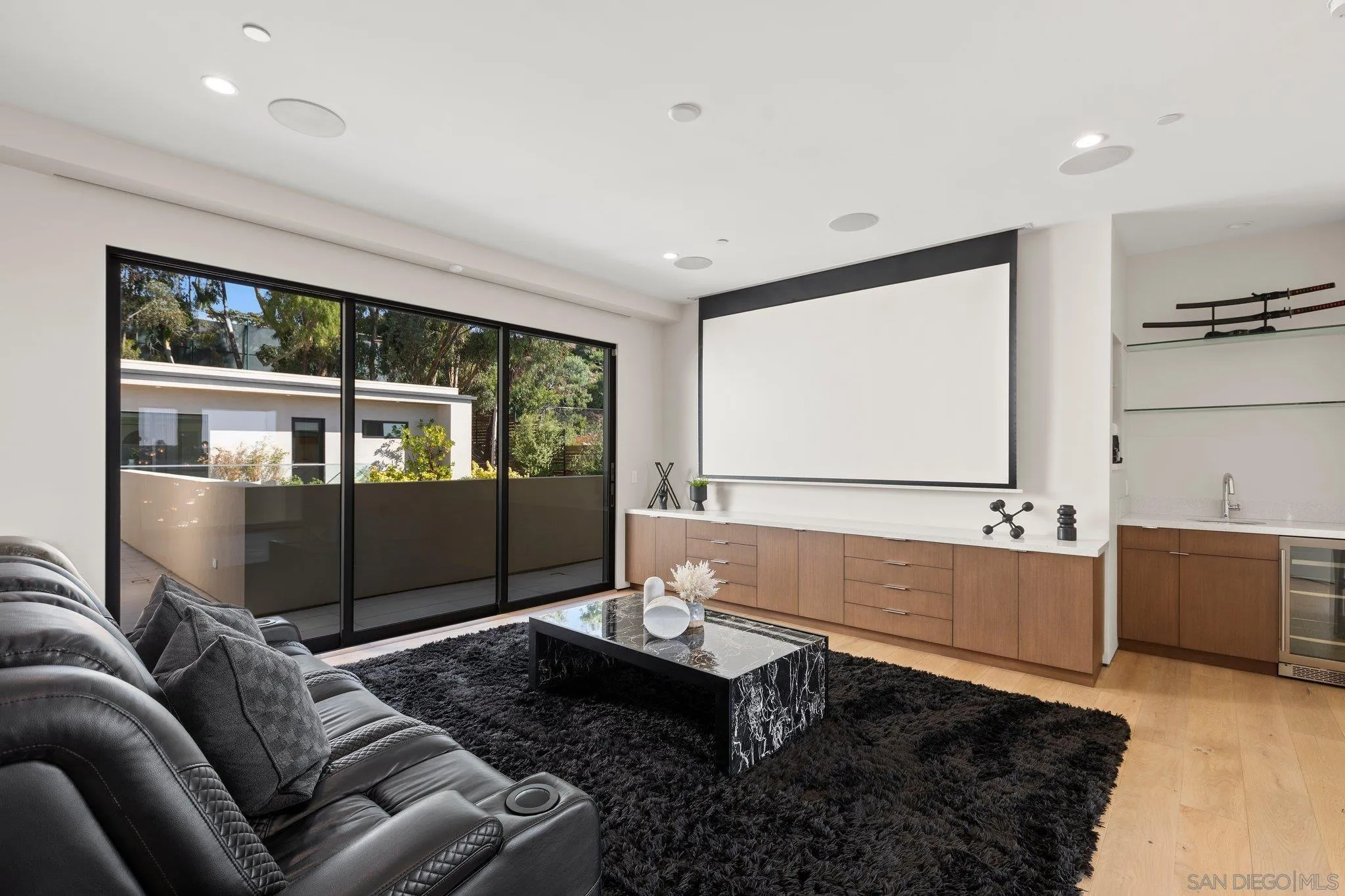 6349 Castejon Drive La Jolla, CA 92037 - Photo 32 of 43 a living room with a large window