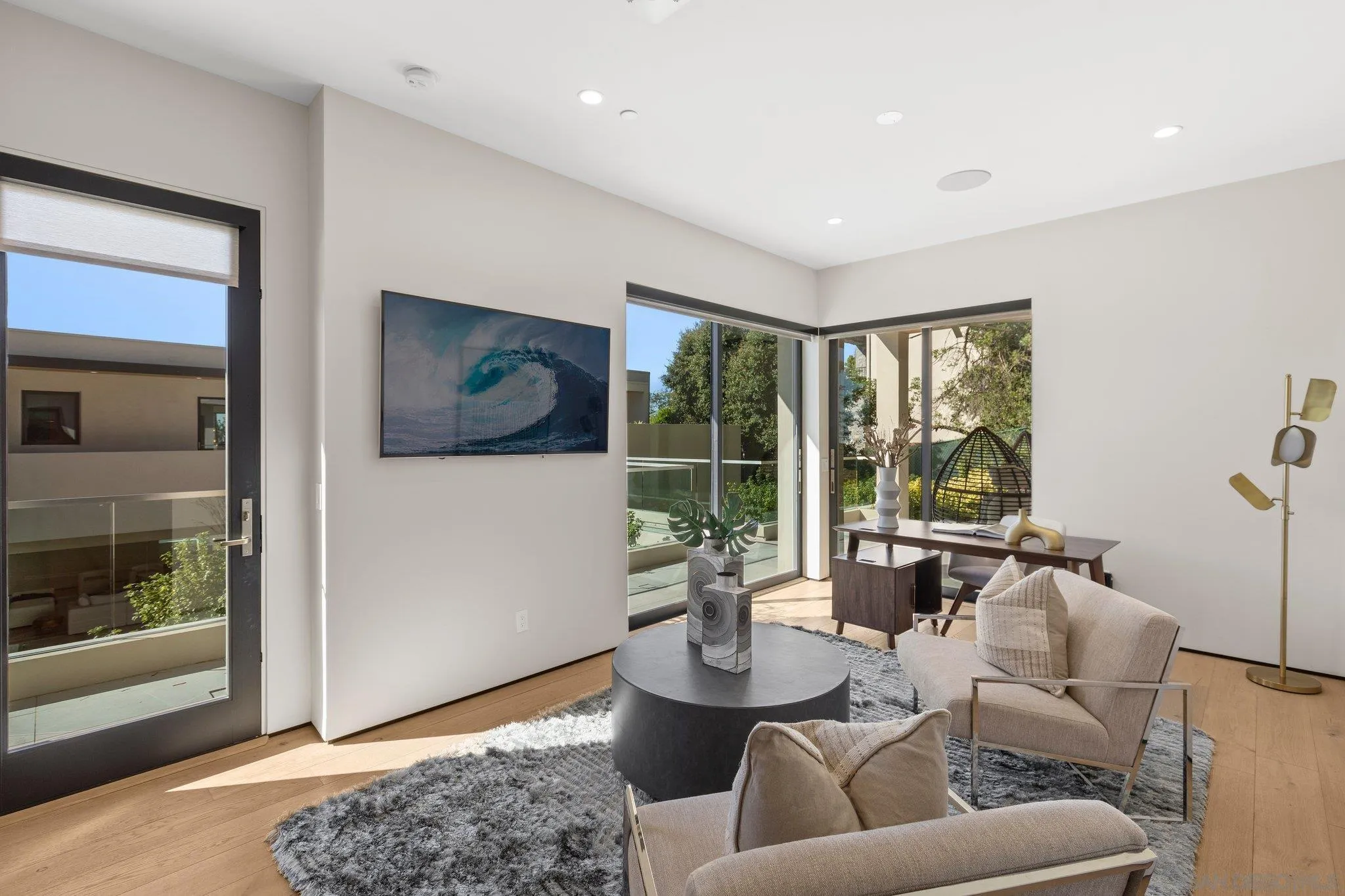 6349 Castejon Drive La Jolla, CA 92037 - Photo 38 of 43 a living room with furniture and a large window