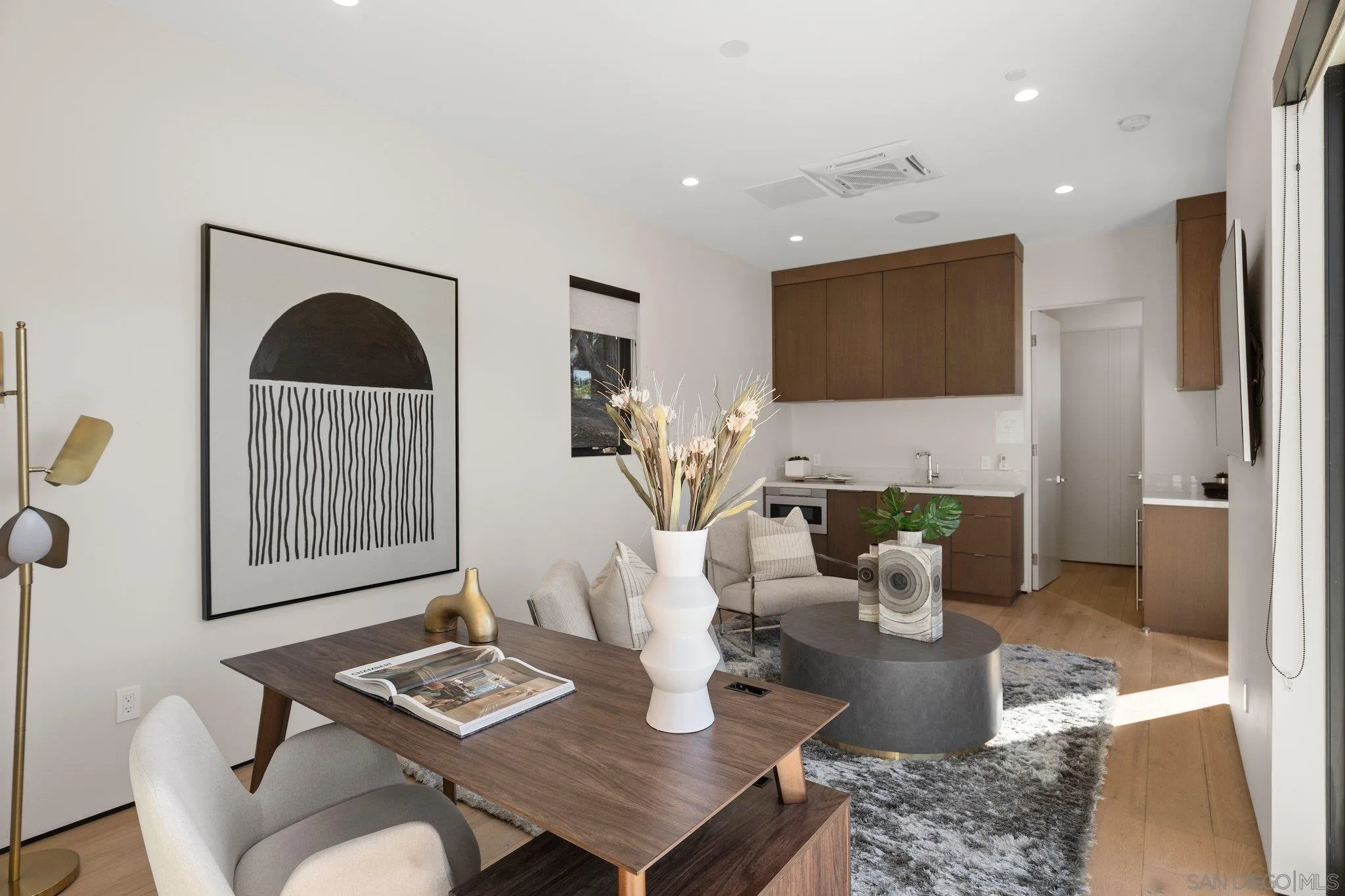 6349 Castejon Drive La Jolla, CA 92037 - Photo 39 of 43 a living room with furniture and a wooden floor