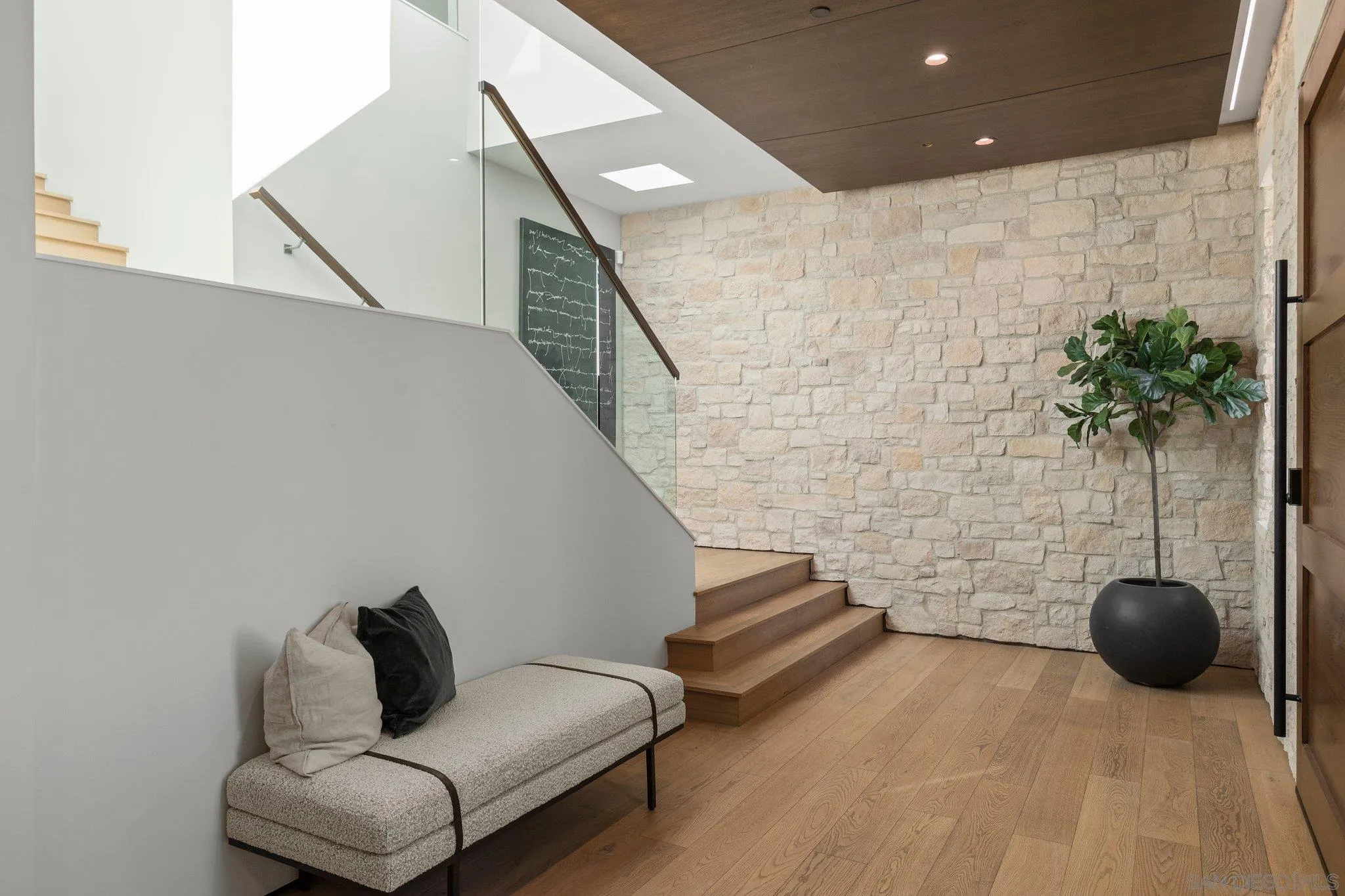 6349 Castejon Drive La Jolla, CA 92037 - Photo 41 of 43 a living room with furniture and a potted plant