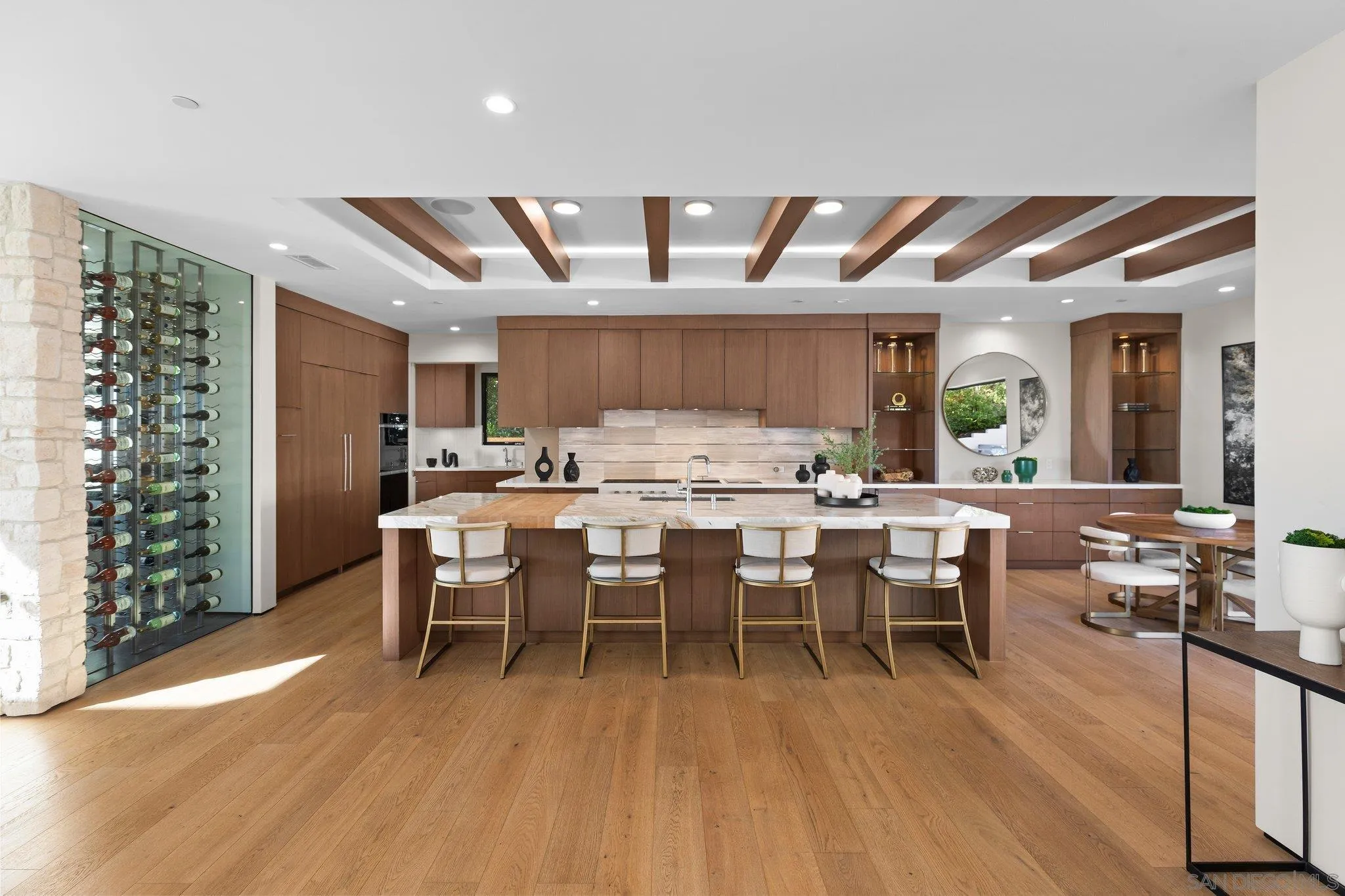 6349 Castejon Drive La Jolla, CA 92037 - Photo 9 of 43 a view of a dining room with furniture window and wooden floor