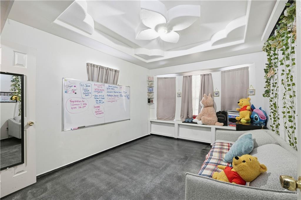 121 Jo Beth Street Alton, TX 78573 - Photo 5 of 12 a room with furniture and baby bed