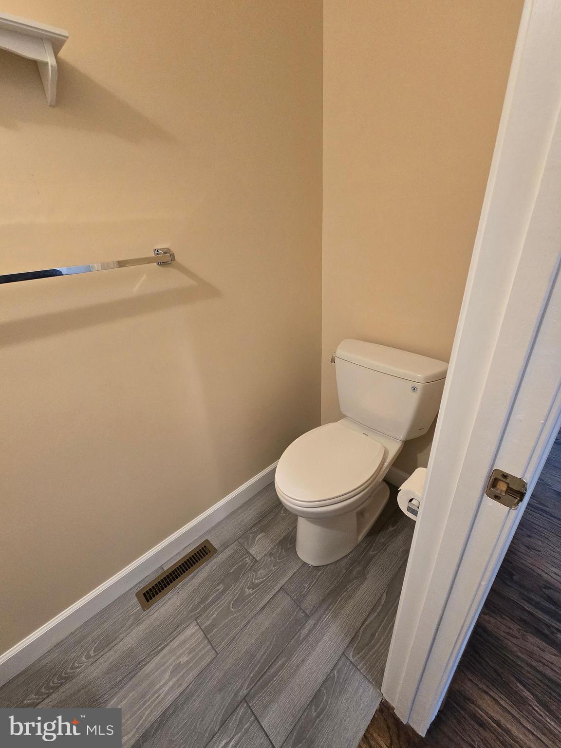 32155 River Road Millington, MD 21651 - Photo 22 of 54 a white toilet sitting next to a shower