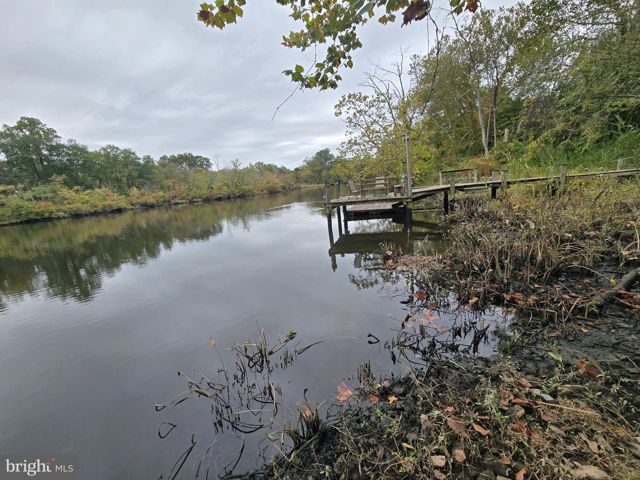 32155 River Road Millington, MD 21651 - Photo 3 of 54 a view of a lake with a mountain from a lake view