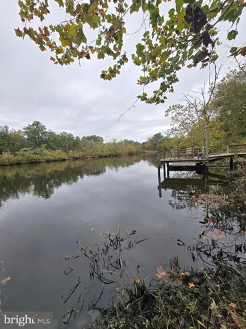 a view of lake with green space