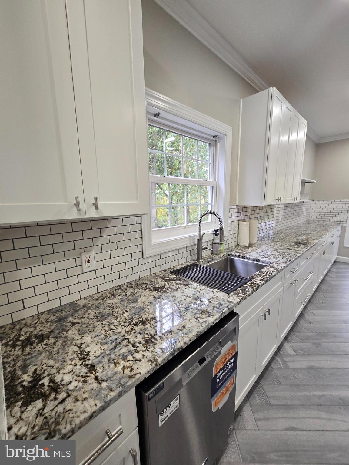 32155 River Road Millington, MD 21651 - Photo 8 of 54 a kitchen with granite countertop a sink and a window