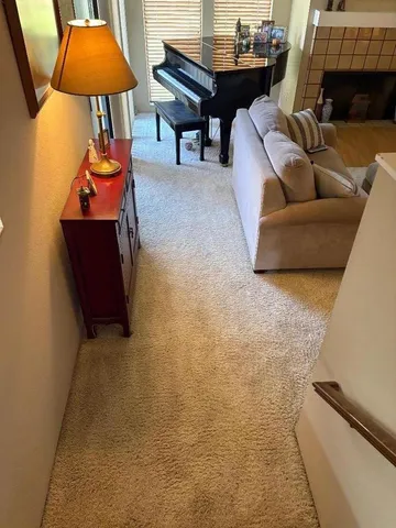 a white toilet sitting next to a bathroom sink