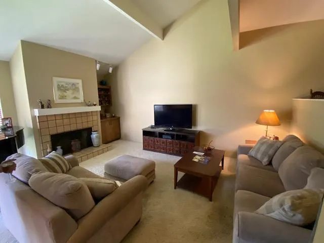 a en suite bathroom with a double vanity sink mirror and shower