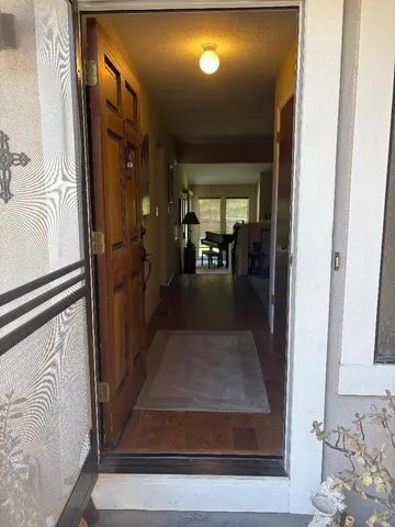 a kitchen with stainless steel appliances cabinets a sink and a window