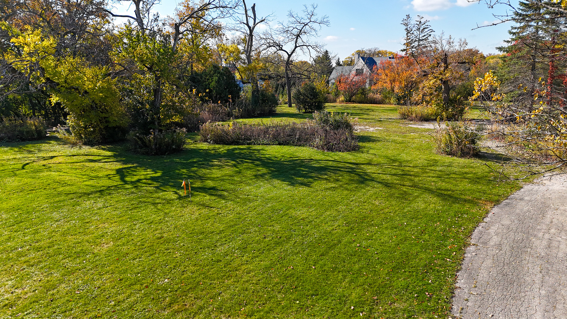 1930 Sunset Ridge Road Northfield, IL 60093 - Photo 1 of 5 a backyard of a house with lots of green space