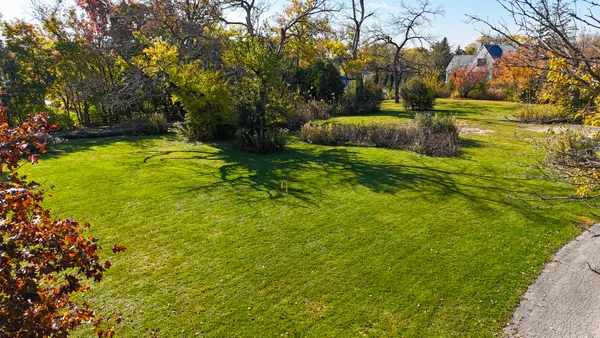 a view of an outdoor space and a yard
