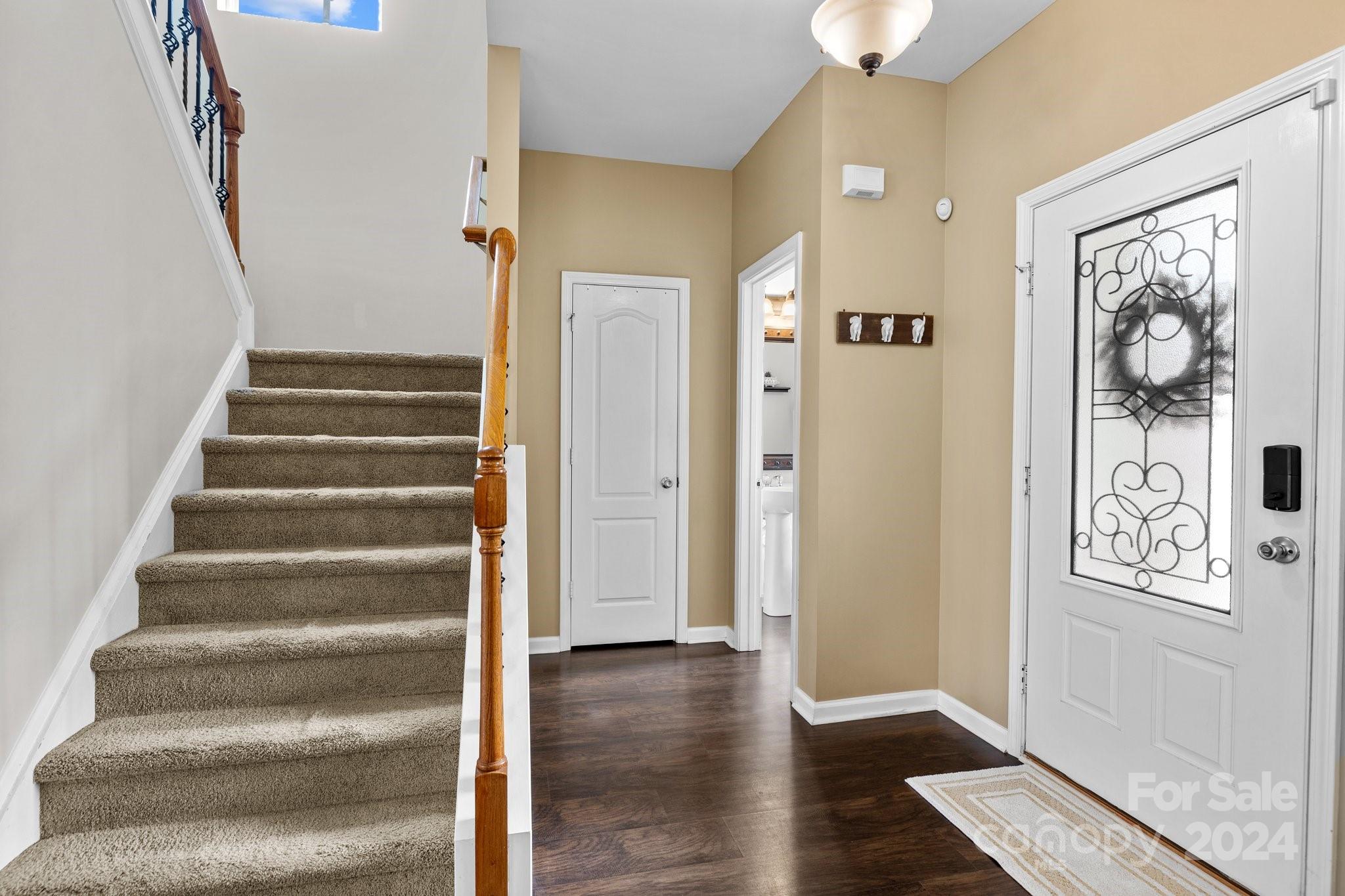 10231 Enniscrone Road Pineville, NC 28134 - Photo 12 of 44 a view of an entryway with wooden floor