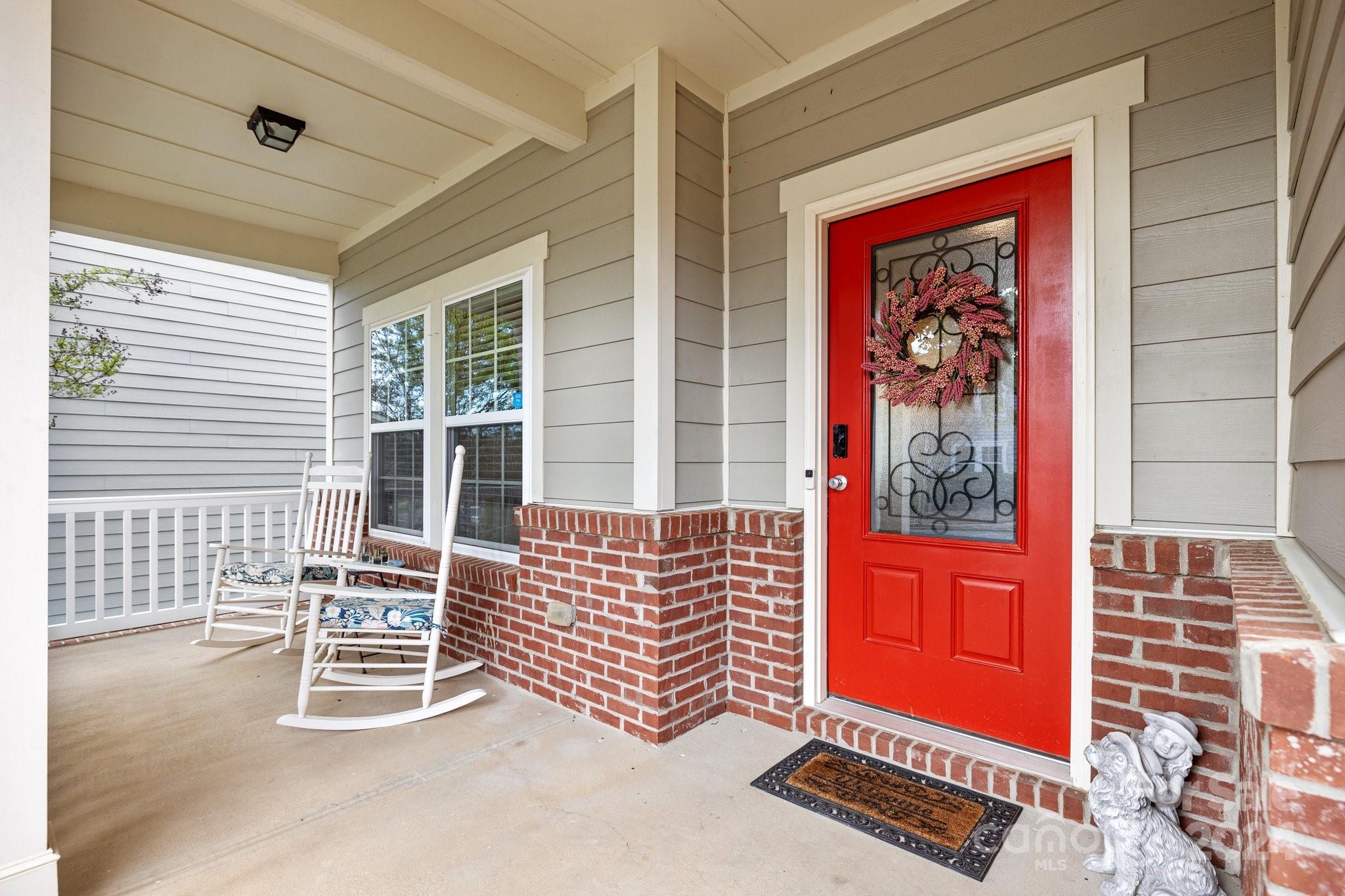 10231 Enniscrone Road Pineville, NC 28134 - Photo 3 of 44 a view of front door with outdoor seating