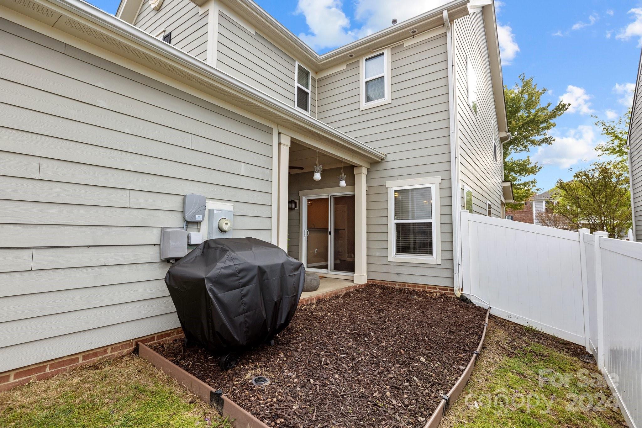 10231 Enniscrone Road Pineville, NC 28134 - Photo 39 of 44 a view of a porch with furniture