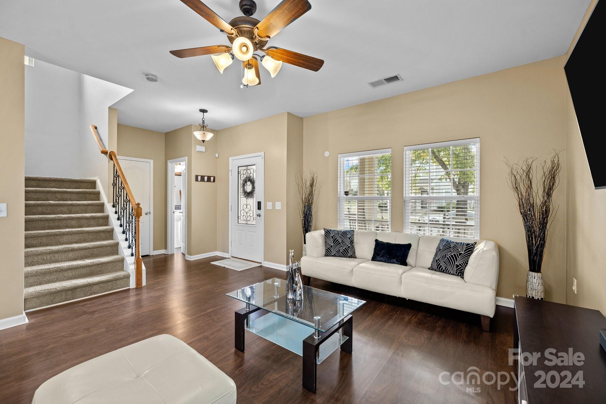 10231 Enniscrone Road Pineville, NC 28134 - Photo 10 of 44 a living room with furniture and a large window