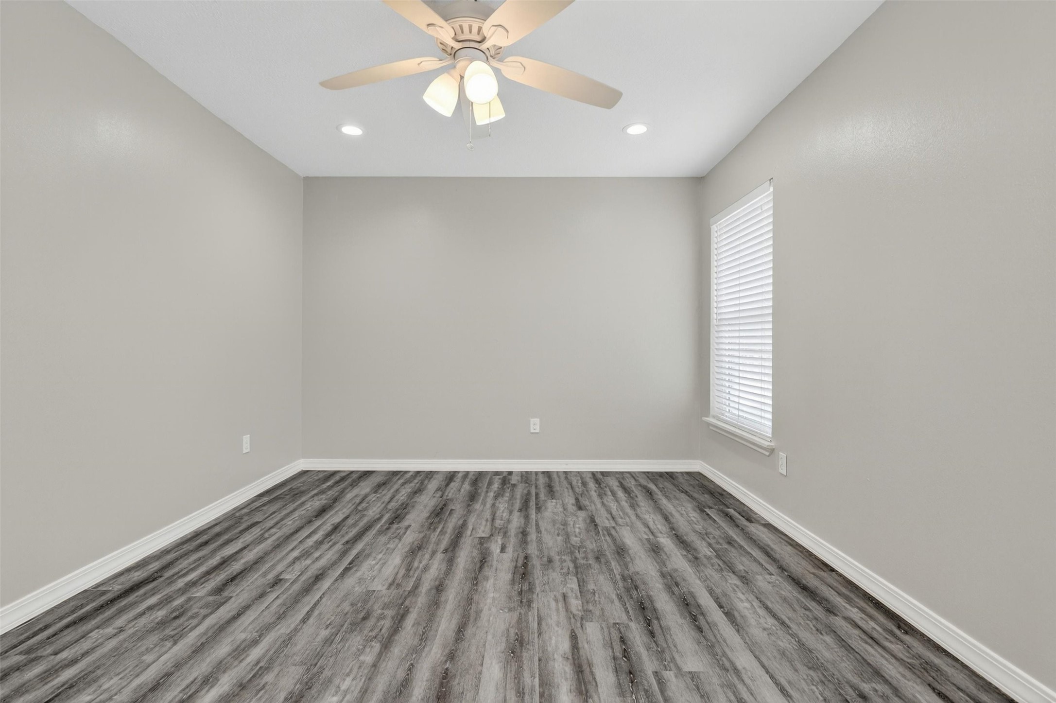 12929 Kingsbridge Lane Houston, TX 77077 - Photo 34 of 42 Bright and versatile room featuring modern flooring, recessed lighting, and a clean contemporary design that today’s buyers are searching for. This flexible space can easily serve as an additional bedroom, home office, fitness room, media space, or hobby area depending on your lifestyle needs. Buyers will love the neutral designer colors, spacious layout, and move-in ready condition that make decorating simple and inviting.