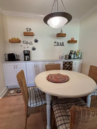 a kitchen with a cabinets and window