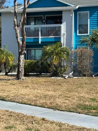a view of a deck with a yard