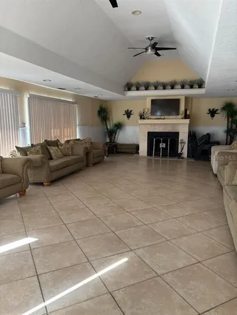 a view of swimming pool with a yard