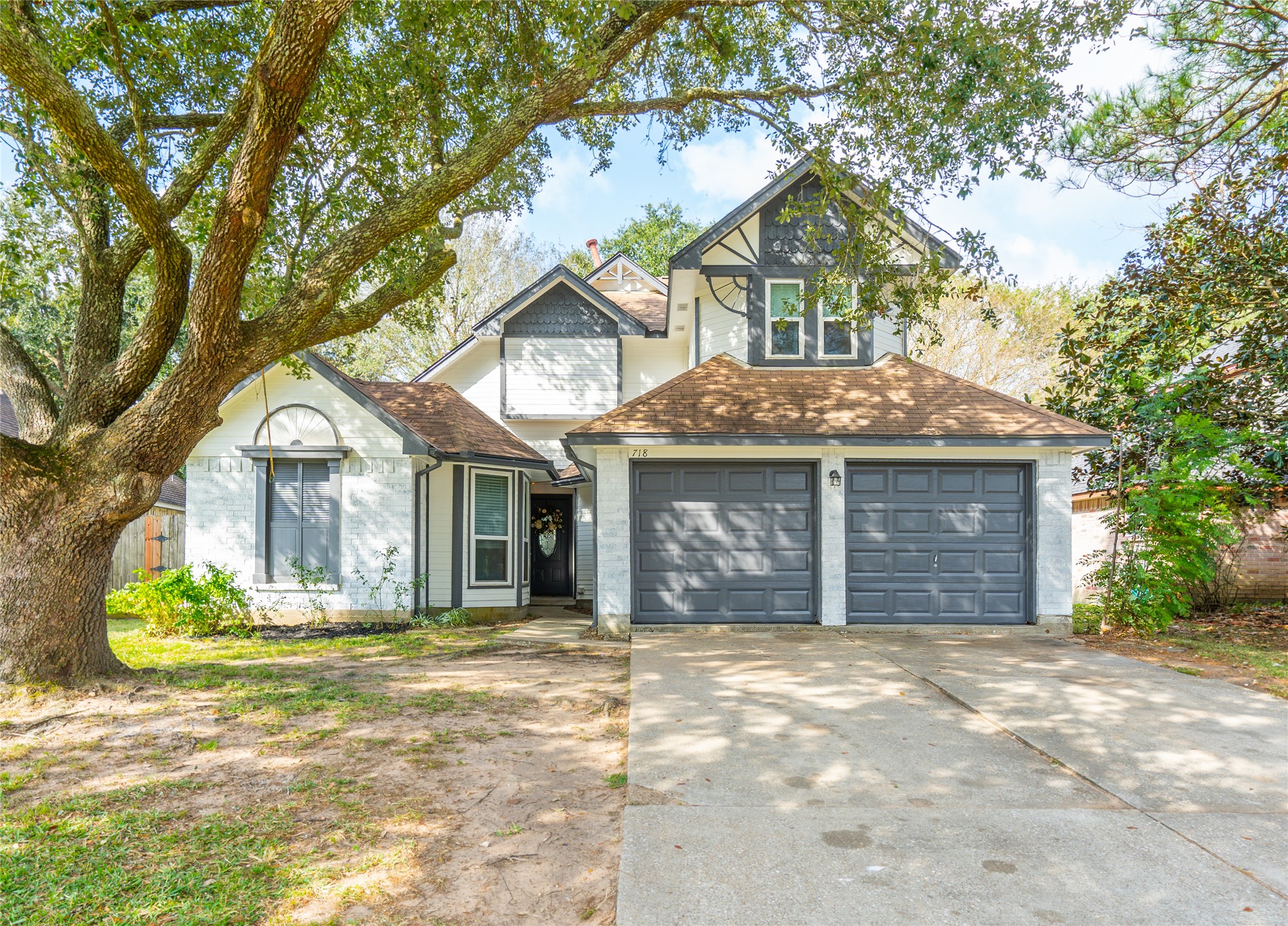 Welcome to The Emerald cottage! This 2 story home is nestled amongst mature trees and is ideally located in the Regency Estate neighborhood in Friendswood Texas.