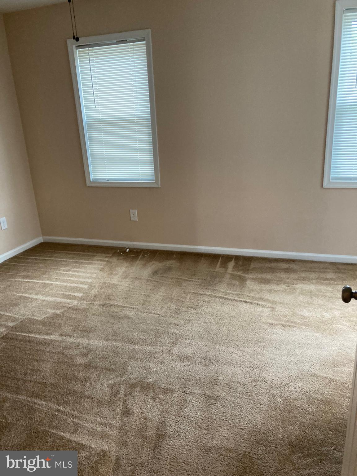 1213 West Old Cold Spring Lane Baltimore, MD 21211 - Photo 11 of 15 an empty room with a window