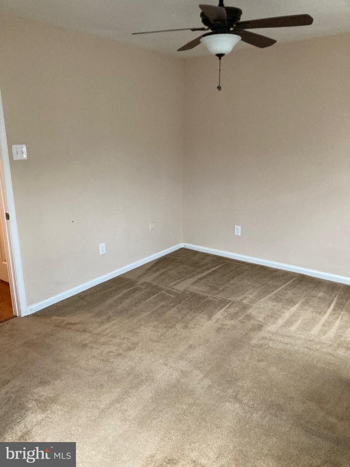 1213 West Old Cold Spring Lane Baltimore, MD 21211 - Photo 12 of 15 a view of a room with a ceiling fan