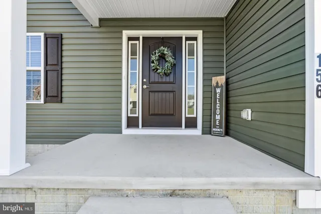 a view of a door and a window