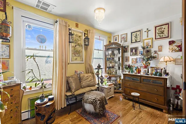 a bedroom with toys and a book shelf